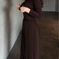 Brown long-sleeved top and pleated skirt set