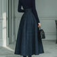 Dark blue turtleneck stretch top and plaid skirt set