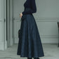 Dark blue turtleneck stretch top and plaid skirt set