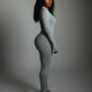 VEYONA Plunge Neck Long Sleeve Jumpsuit