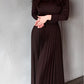 Brown long-sleeved top and pleated skirt set